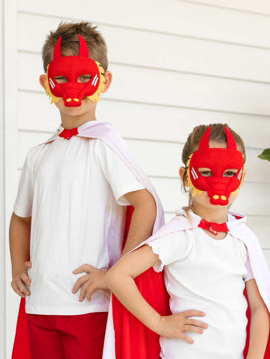 Boy and girl wearing the St. George Illawarra Dragons NRL mask an youth support cape