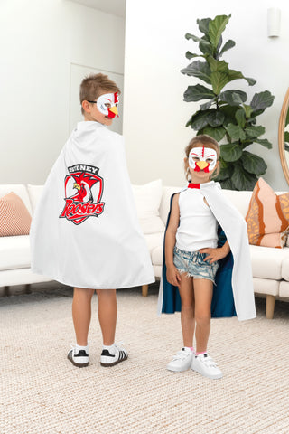 Boy and girl wearing the Sydney Roosters NRL mask and youth supporter cape