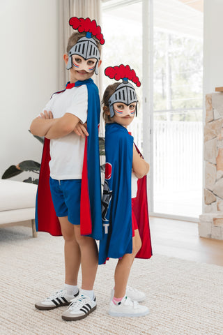 Boy and girl wearing the Newcastle Knights NRL mask and youth supporter cape