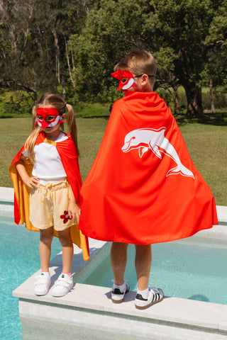 girl and boy wearing the Dolphins NRL Mask and youth supporter cape